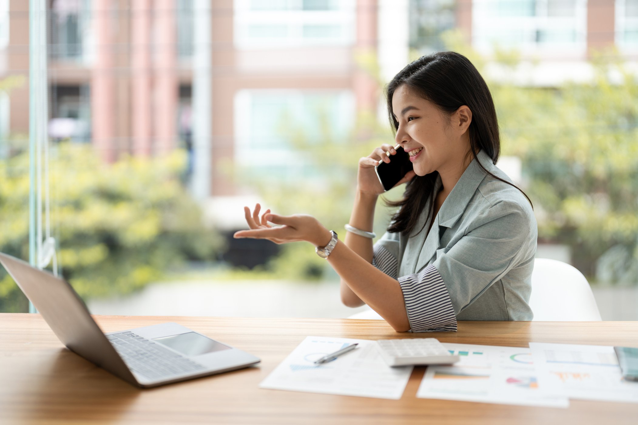 Accountant on a Phone Call in the Office 